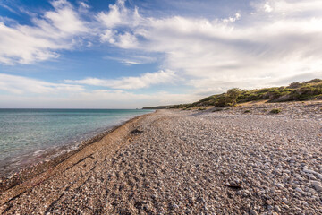 Fototapeta na wymiar Pebble beach on the Greek island of Rhodes