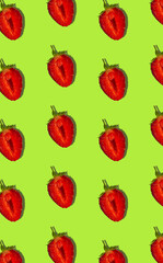Sweet red strawberry fruits with hard shadows flat lay on pastel green background website vertical banner. Creative layout of fresh summer berries. Food fun concept. Trendy pop art pattern design.