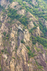the folds of the rocks of metamorphic origin / the folds and stratifications originated due to high pressures and temperatures occurred during the formation of the Alps