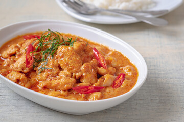 Fototapeta premium Chicken panang curry served with rice, Thai food