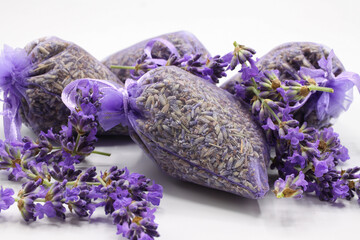 Close up of isolated bagged dried lavender blossom sacs used as moth repellent in wardrobe for...
