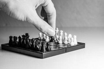Chess, white and black on the Board, close-up.