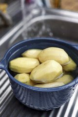 Washed and peeled organic potatoes