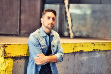 man on the basement background in the city