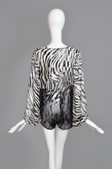 lifeless mannequin with clothes isolated grey background studio