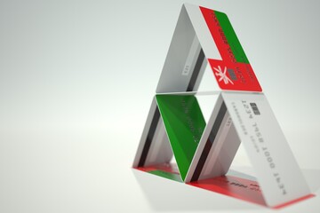 Flag of Oman on bank card house, fictional data. Financial instability related 3D rendering