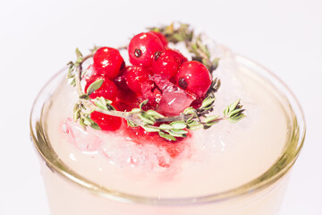 Cocktail with cranberries on the bar