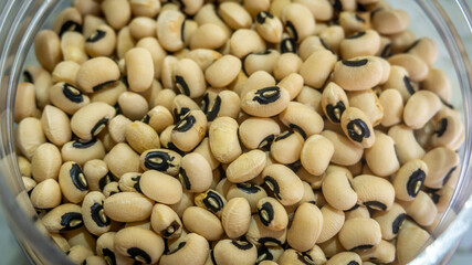 Close up detail of full black-eyed beans texture background. Selective focus.