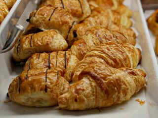 Freshly baked butter croissants at a breakfast buffet