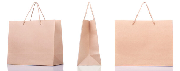 Group of PAPER SHOPPING BAGS ISOLATED ON WHITE BACKGROUND. 3 Views. FRONT SIDE AND 45 DEGREE VIEW.