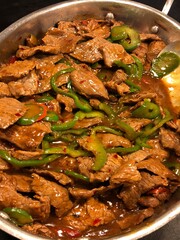 Savory beef dish with slices of green and red peppers, a favorite recipe with many from the Southeast Asian countries.
