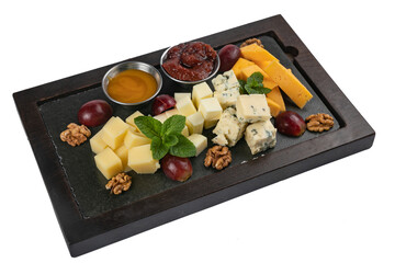 assorted cheese on a tray on a white isolated background

