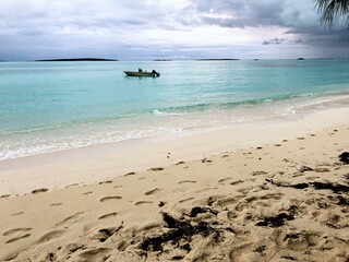 Tropical beach in Georgetown, Bahamas on a beautiful day