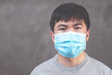 Man wearing hygienic mask to prevent flu