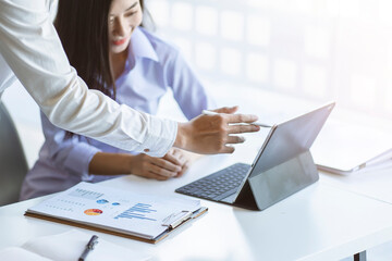 Business team discussing together in conference room during meeting at office. Teamwork, brainstorm and ideas concept.