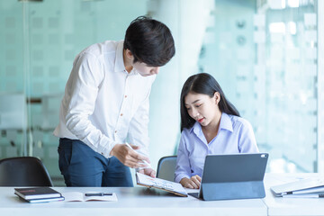 Business team discussing together in conference room during meeting at office. Teamwork, brainstorm and ideas concept.