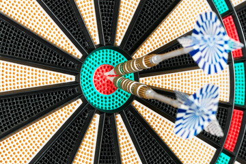 Two Arrows In The Centre Of A Dart Board