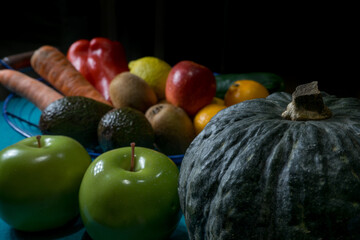 fruits and vegetables in basket with background