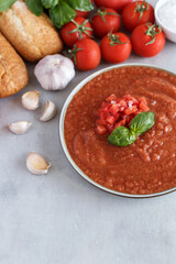 A bowl of fresh gazpacho. Cold tomato soup.