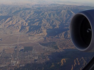 Aerial view of the outskirts of Los Angeles, California and mountains in the background with the...