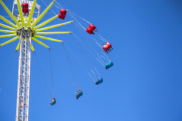 flying swing in Dam Square Amusement Park, Amsterdam Netherlands