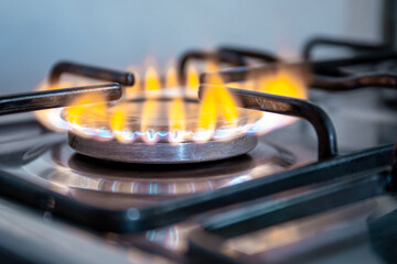 lit stove in old gas stove