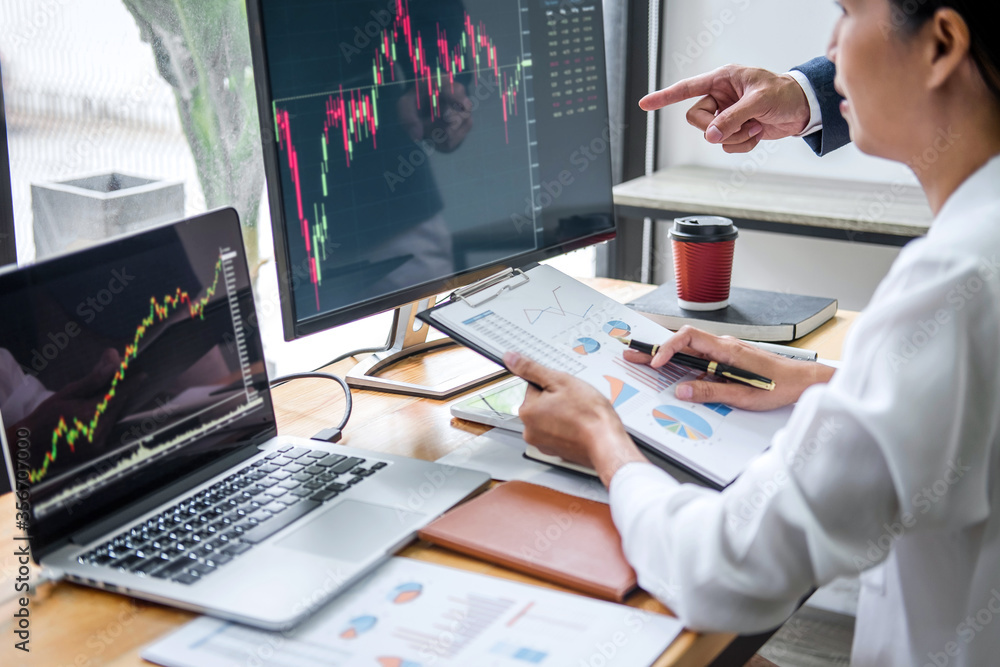 Poster business team partner working with computer, laptop, discussion and analyzing graph stock market tra