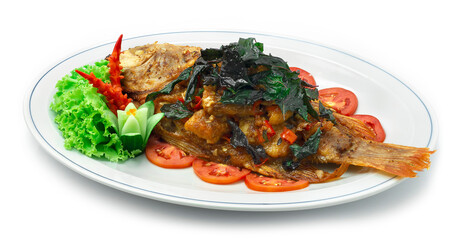 Fried Fish with Spicy Sauce ontop crispy Basil Thai Food