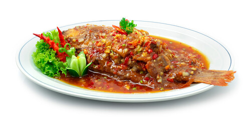 Fried Fish with Sweet and Spicy Sauce ontop Thai Food