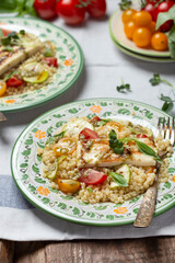 Ptitim or Israeli pasta with tomatoes and halloumi