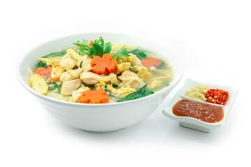 Thai Sukiyaki Soup with Chicken,Egg and Vegetables Carved Carrots flowers shape  served Sauce