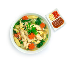 Thai Sukiyaki Soup with Chicken,Egg and Vegetables Carved Carrots flowers shape  served Sauce