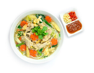 Thai Sukiyaki Soup with Pork and Vegetables Carved Carrots flowers shape served Sauce