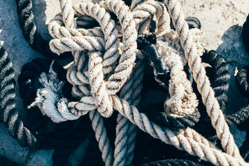 Vintage old sea rope near the port, summer time