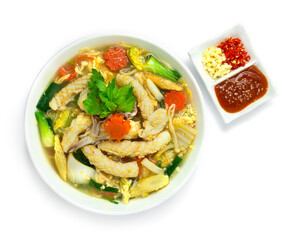 Thai Sukiyaki Soup with Squids,Egg and Vegetables Carved Carrots flowers shape served Sauce