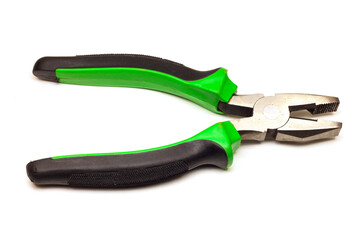 large pliers with green and black handles, on a white background, isolated