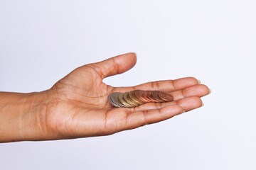 Woman palm showing coins. photo isolate on white side view copy space

S