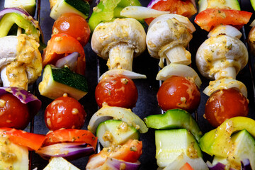 Vegetables skewers marinated in garlic and herbs sauce