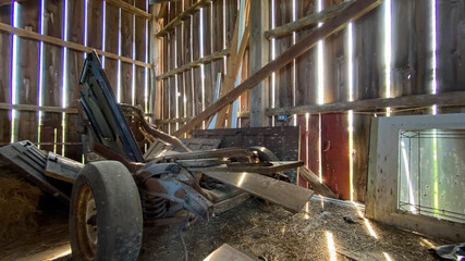 old barn and barnyard filled with collectables old cars