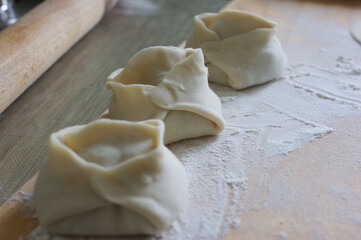 Handmade dumplings process in the kitchen