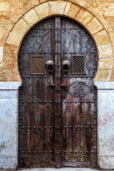 Tunisia. Tunis. Typical Traditional door in wood decorated with nails