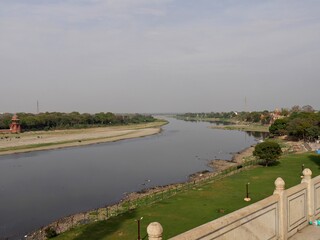View of the Yamuna River behind the Taj Mahal in Agra, India. Yamuna, also known as the Jamuna or...