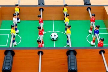 Fototapeta premium Close up table soccer with players and a ball.