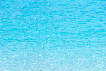 Transparent blue sea water background