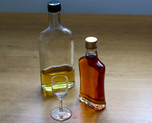 homemade alcohols in glass bottles - obrazy, fototapety, plakaty