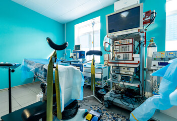 Hospital interior with operating surgery table, lamps and ultra modern devices, technology in modern clinic