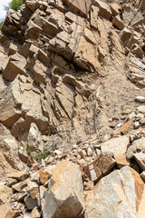 a fragment of gray-brown rock, close-up for background or texture.