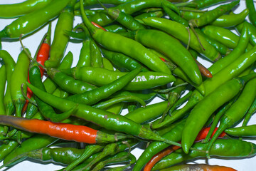 Green & Red Chili Close Up Background Texture Image.