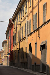 Fototapeta na wymiar piacenza e case colorate in italia, colorful buildings in piacenza city in italy