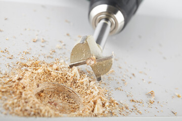 Forstner cutter for cutting holes in wood, work on the additive of furniture fittings